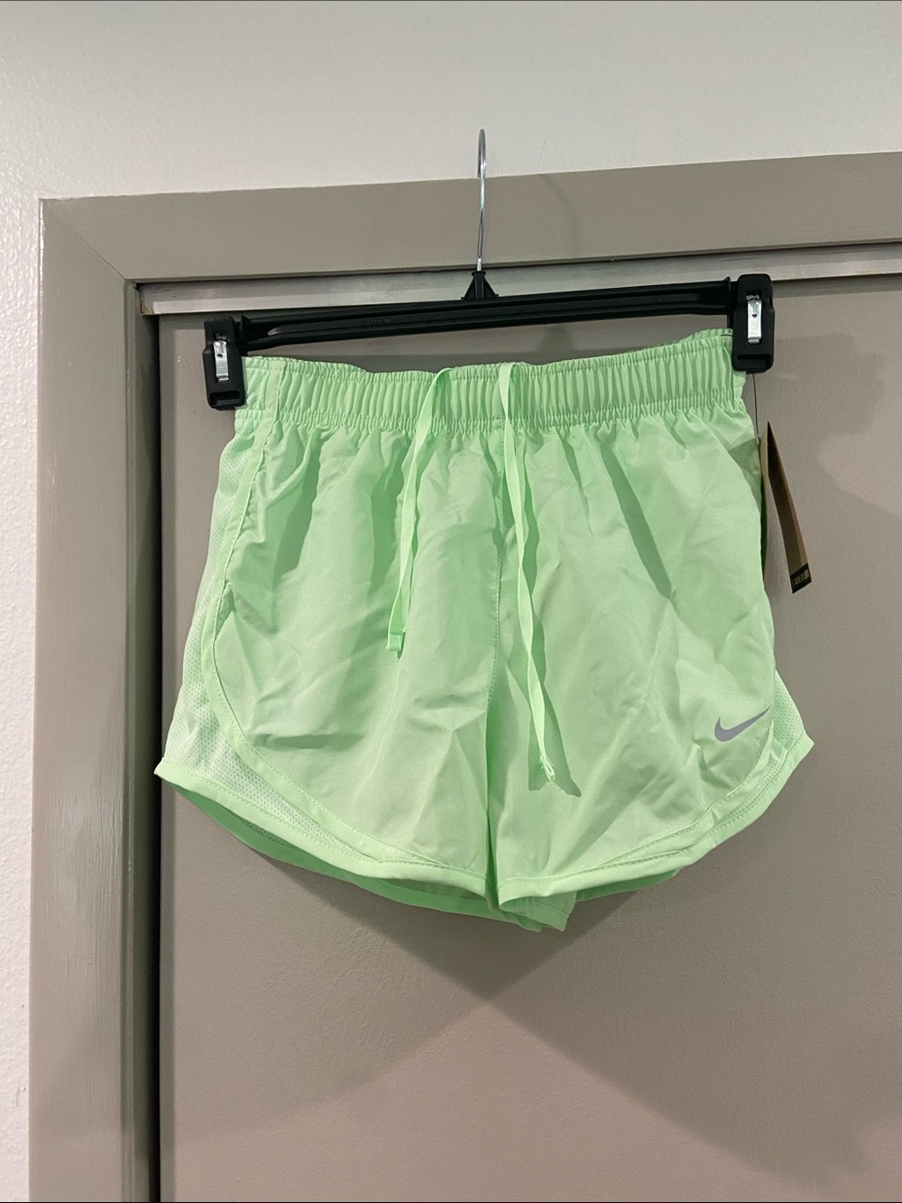 Nike Women's Mint Green Mesh-Trim Athletic Shorts